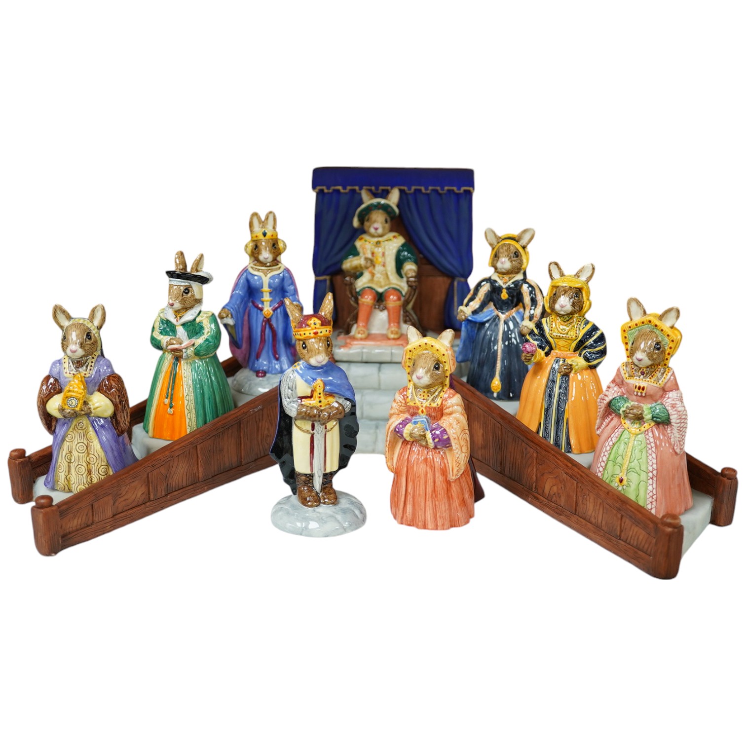 A Royal Doulton, Bunnykins, Tudor Collection, stand and nine characters (all boxed). Condition - good